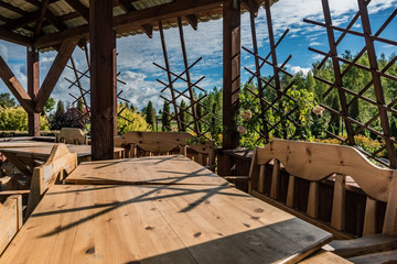 Arbor with table and chairs.