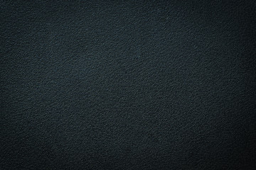 Fototapeta premium Close-up of black gray plastic material seamless texture. Surface of rough abstract dark black matte background. Design in your work backdrop, concept copy space for text.