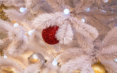 Christmas composition of silver Christmas tree branches and Christmas balls