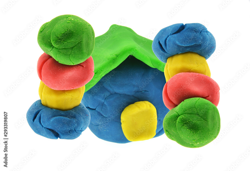 Wall mural colorful dough toy isolated on white background