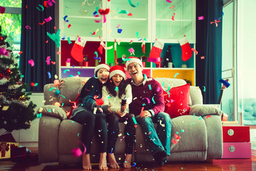 Christmas family.group of family playing on the floor.holiday party decoration in living room