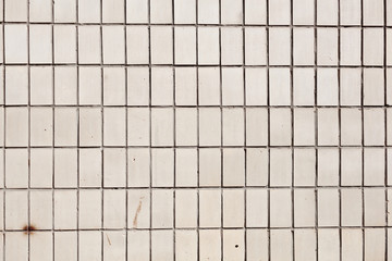Texture, tile, wall, it can be used as a background. Tile texture with scratches and cracks