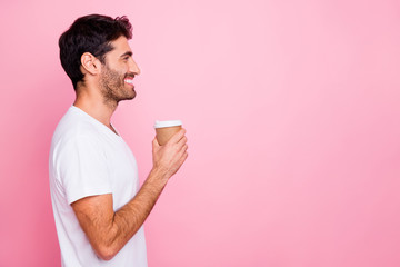 Profile side photo of funky positive middle eastern man hold take way cup with coffee have free...