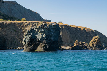 Fototapeta premium Kara-Dag mountains, view of the rocks from the sea, Crimea, Russia.