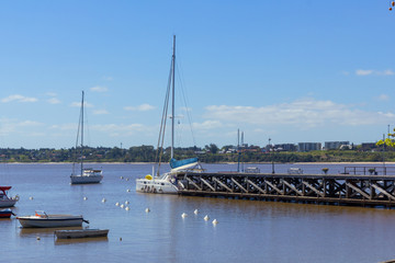 Boats anchored in the port of the city of Colonia del Sacramento, Uruguay, on the Rio de la Plata. Colonia del Sacramento is one of the oldest cities in Uruguay.