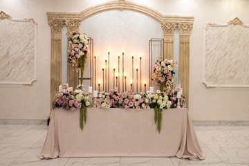 Wedding decor in the restaurant for the holiday. Floristry, decoration of the celebration
