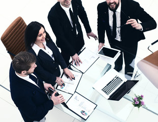 successful business team is preparing for presentation of a new financial project of the company