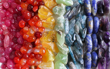 Abstract background of colorful gemstones seven colors of rainbow mineral stones, reiki healing...