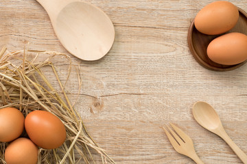 Eggs for cooking on wood background top view.Flat lay.
