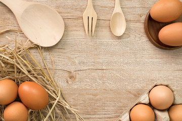 Eggs for cooking on wood background top view.Flat lay.
