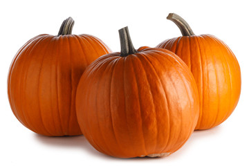 Three pumpkins isolated on white