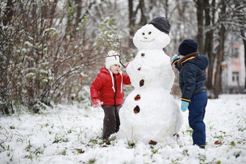 Children in winter park play