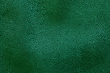 curved surface is painted green with texture. background