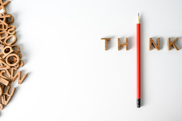 One  Pencil with word think leadership and uniqueness concept. Stand out from the crowd. Think...