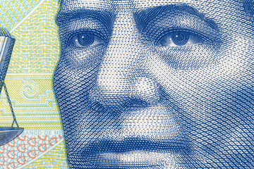 Macro close up photo of Benito Juarez on the Mexican 20 Peso currency note.  