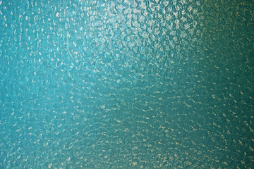 Fototapeta na wymiar Glass blue texture as background