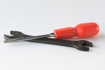 wrench and screwdriver on a white background