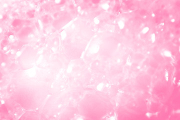 Beautiful abstract texture color white and pink bubbles background in water on pink background pattern clear soapy shiny