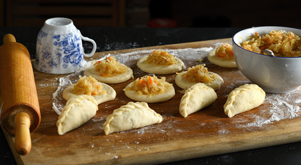 The process of making pies with cabbage at home