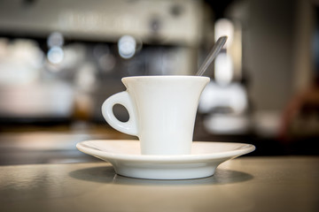 Cup of espresso coffee on table in Italian cafe