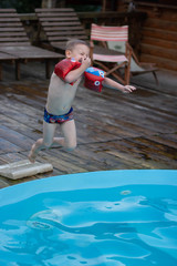 little boy in swimming pool