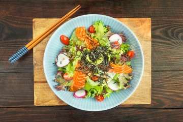 Salmon Salad Japanese style on wood table.Healthy Concept.Top view