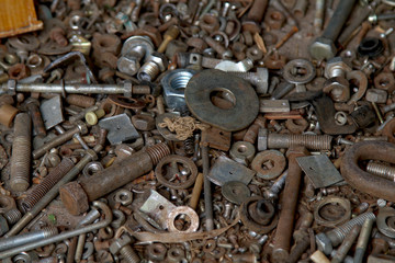 A pile of hardware nuts, bolts, washers, screws