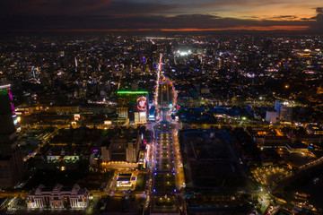Fototapeta premium Phnompenh capital of Cambodia on the sunset with beautiful landscape by drone with Koh Pich island 