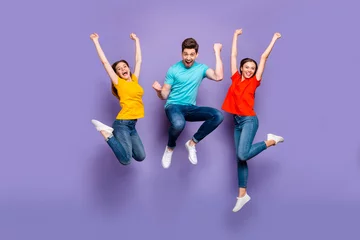 Foto op Plexiglas Full length size body photo of three funny funky ecstatic excited delightful buddies having fun on weekend isolated violet background © deagreez