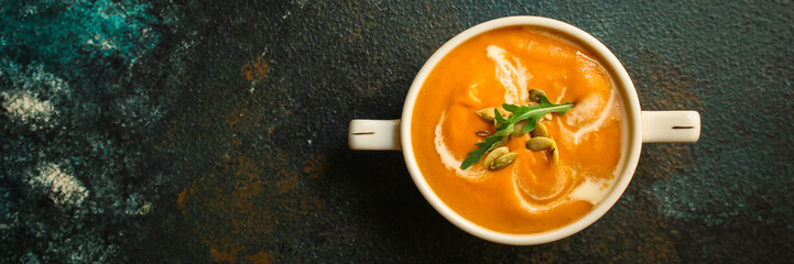 pumpkin or carrot cream soup (first course, healthy food, diet) menu concept. food background. copy space. Top view