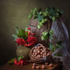 Autumn still life with harvest of vegetables and nuts