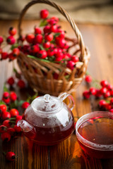 hot tea from medicinal fruits of red ripe rosehip