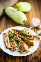 oven-baked zucchini in batter with garlic and herbs