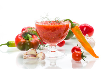 homemade hot adjika from tomatoes, hot and sweet peppers with spices