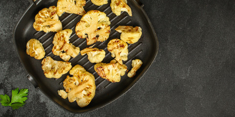 cauliflower grilled (fried grill vegetables or snack salad, bruschetta with tomato) menu concept. food background. copy space. Top view