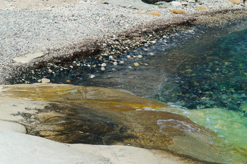Beach on the sea with turquoise water and white cliffs