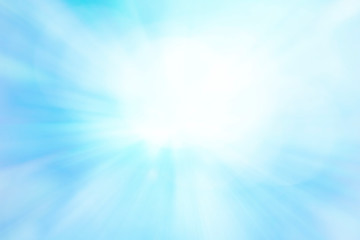 Blurred rays of light abstract blue background