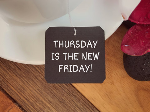 Motivational and inspirational wording - Thursday Is The New Friday Written on a paper.