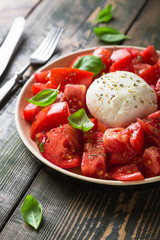 Juicy tomatoes, mozzarella and fresh basil. Caprese salad