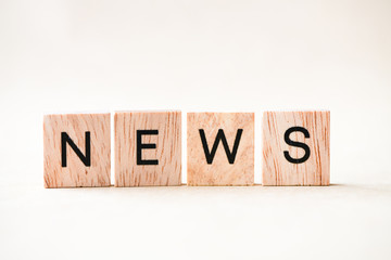 News text wooden blocks 