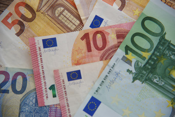 euro money cash business debt public background.Money bills in Euros. Money used to buy in the market, to invest in companies, industries. The banks use it to leave it and earn more money.