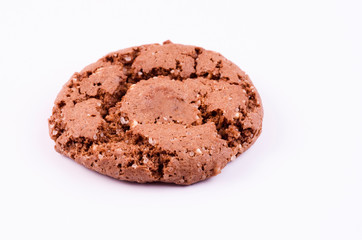 Appetizing brown cookies with cracks on a light background