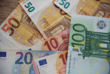 euro money cash business debt public background.Money bills in Euros. Money used to buy in the market, to invest in companies, industries. The banks use it to leave it and earn more money.