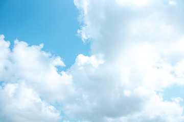 Nature Bright blue Sky with white clouds on blackground. Beautiful sky and clouds in the afternoon.