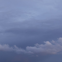 Beautiful picturesque sky with cirrus clouds in blue and white.