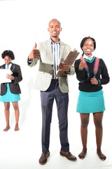 group of students and a teacher with thumbs up