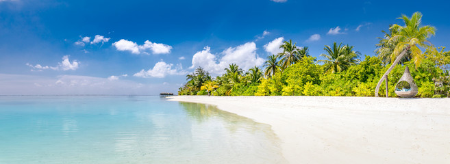 Summer landscape panorama. Amazing beach view, palm trees and white sand. Paradise island view, cam sea water with reflection, inspirational beach