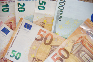 euro money cash business debt public background.Money bills in Euros. Money used to buy in the market, to invest in companies, industries. The banks use it to leave it and earn more money.