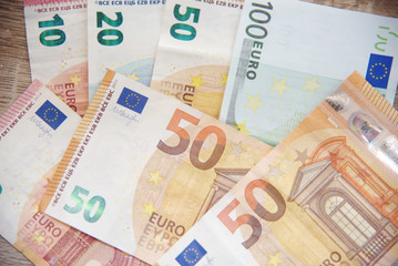 euro money cash business debt public background.Money bills in Euros. Money used to buy in the market, to invest in companies, industries. The banks use it to leave it and earn more money.