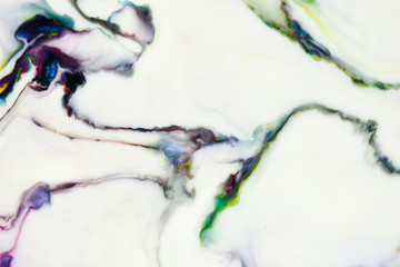 Abstract painting technique Ebru .Turkish style Ebru on the water with acrylic paints press waves.Modern art marble liquid texture